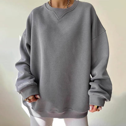 Löst sittande sweatshirt med ribbad krage för dam